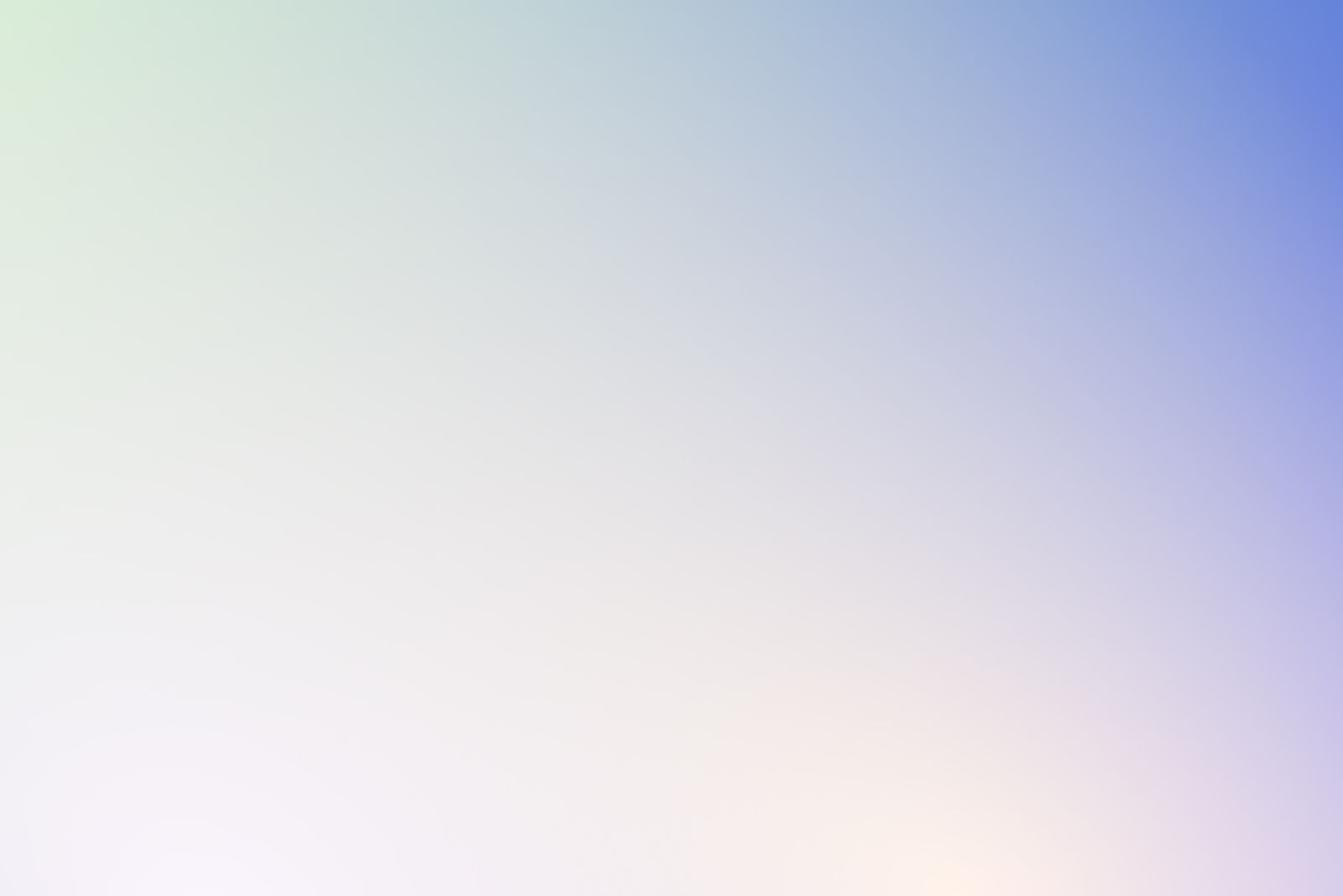 A soft abstract gradient of green, blue, and violet light